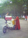 african-garbed man buying good humor