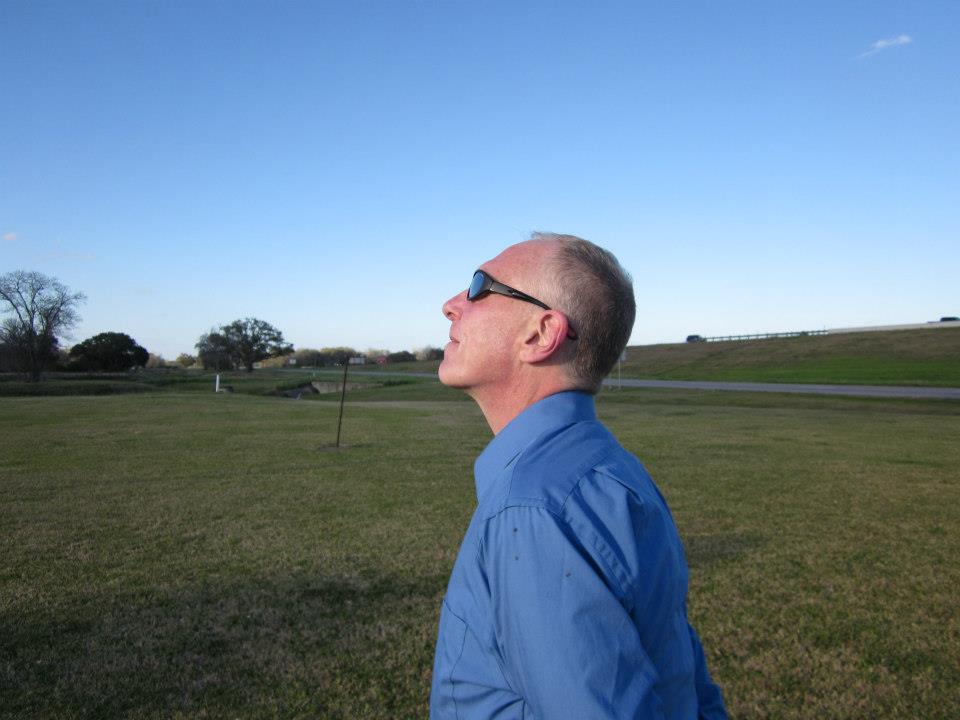 chris hodges admiring the large, blue texas sky