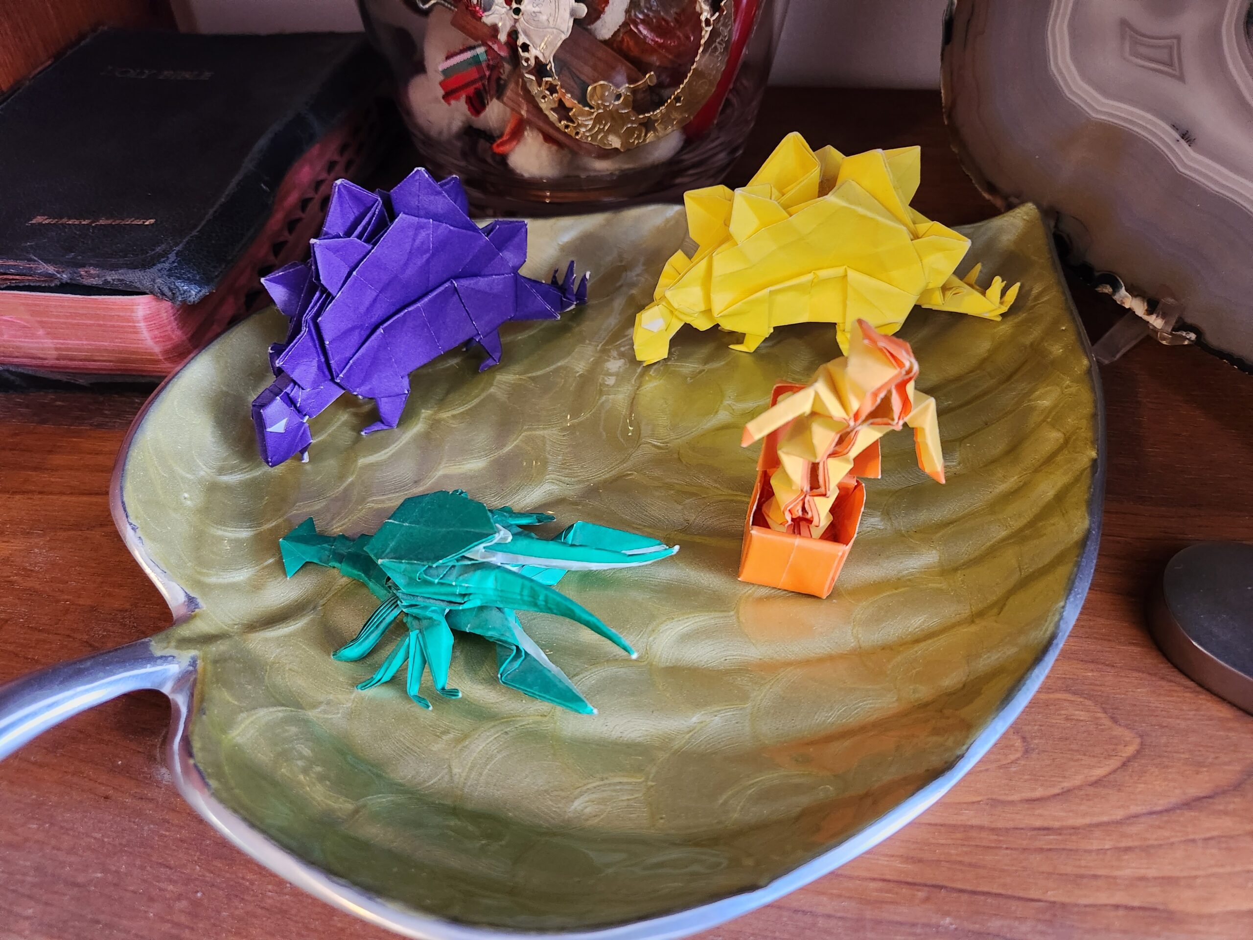 complex origami stegosauruses, crustacean and jack-in-the-box
